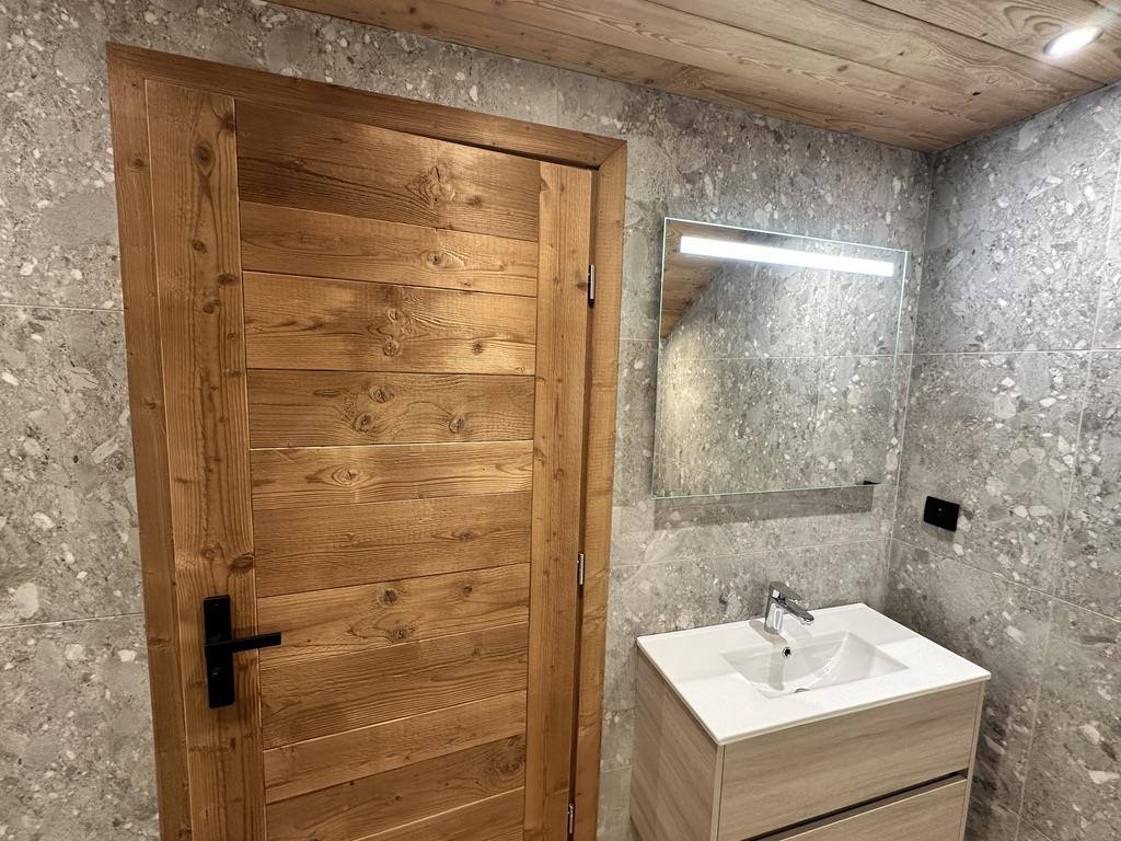 Reclaimed-wood door &amp; vanity